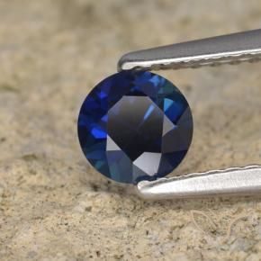 Zafiro Azul oscuro natural de 0.58 ct, Redondo, VVS