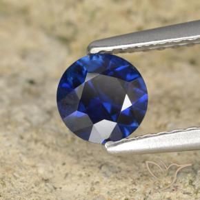 Zafiro Azul oscuro natural de 0.59 ct, Redondo, VVS