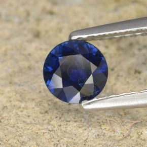 Zafiro Azul oscuro natural de 0.57 ct, Redondo, VS