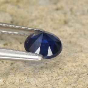 Zafiro Azul oscuro natural de 0.57 ct, Redondo, VS