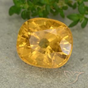 Zafiro Naranja dorado intenso natural de 6.85 ct, Ovalada, VS-SI