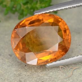 Zafiro Naranja oscuro medio natural de 6.70 ct, Ovalada, VS-SI