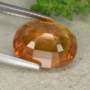 Zafiro Naranja oscuro medio natural de 6.70 ct, Ovalada, VS-SI