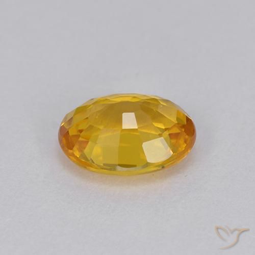 Zafiro Dorado natural de 0.98 ct, Ovalada, VVS