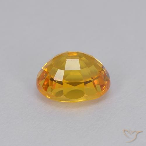 Zafiro Dorado oscuro natural de 1.22 ct, Ovalada, VVS