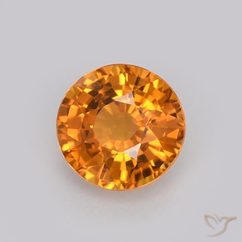 Zafiro Dorado naranja intenso natural de 0.99 ct, Redondo, VVS