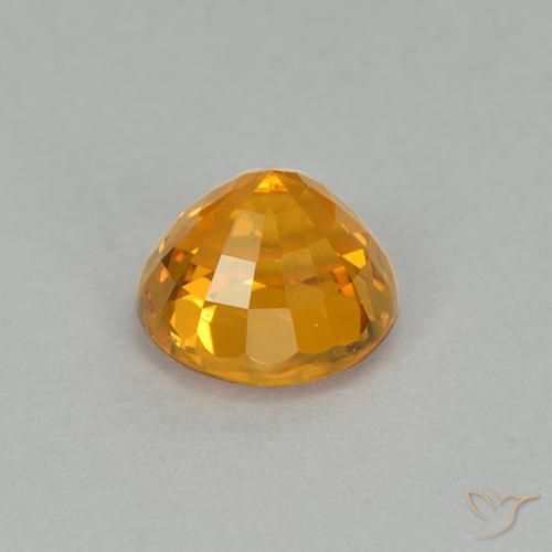 Zafiro Dorado naranja intenso natural de 1.00 ct, Redondo, VVS