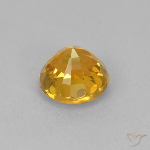 Zafiro Naranja dorado intenso natural de 1.02 ct, Redondo, VVS