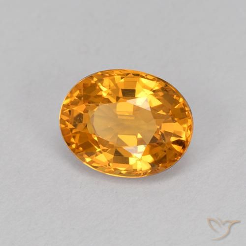 Zafiro Dorado naranja natural de 1.03 ct, Ovalada, VVS