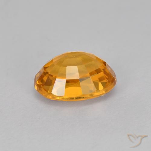 Zafiro Dorado naranja natural de 1.03 ct, Ovalada, VVS