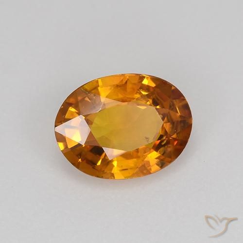 Zafiro Naranja terroso natural de 0.80 ct, Ovalada, VS