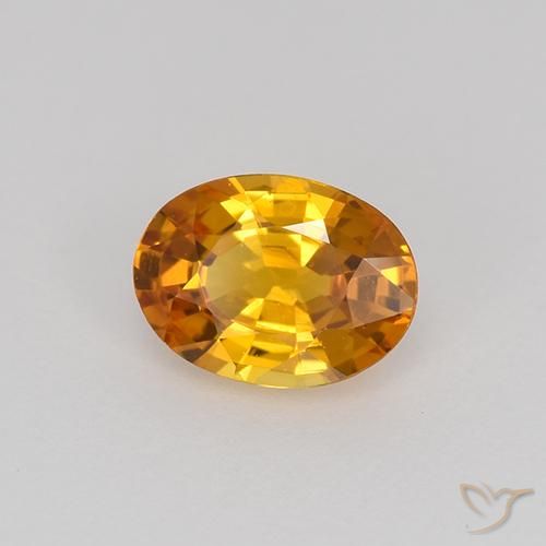 Zafiro Naranja terroso natural de 0.69 ct, Ovalada, VVS-VS