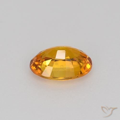 Zafiro Naranja terroso natural de 0.69 ct, Ovalada, VVS-VS