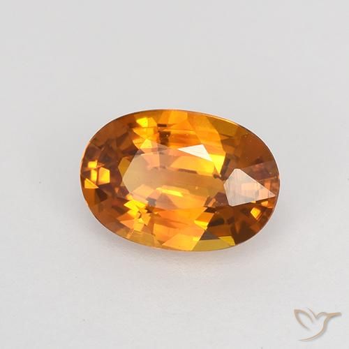 Zafiro Naranja oscuro natural de 0.77 ct, Ovalada, VVS