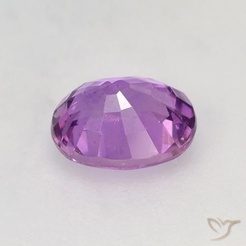Zafiro Violeta medio natural de 0.76 ct, Ovalada, VVS-VS