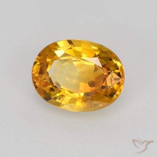 Zafiro Naranja dorado intenso natural de 0.86 ct, Ovalada, VVS