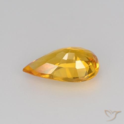 Zafiro Dorado naranja intenso natural de 0.75 ct, En forma de pera, VVS