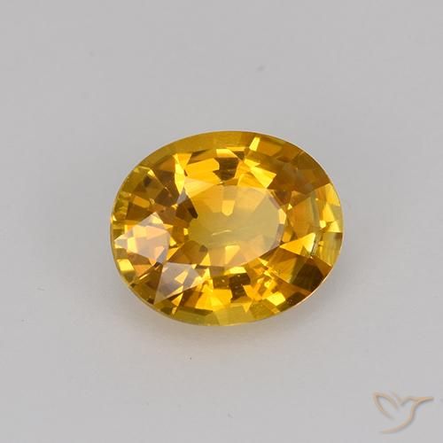 Zafiro Dorado naranja natural de 0.75 ct, Ovalada, VVS-VS