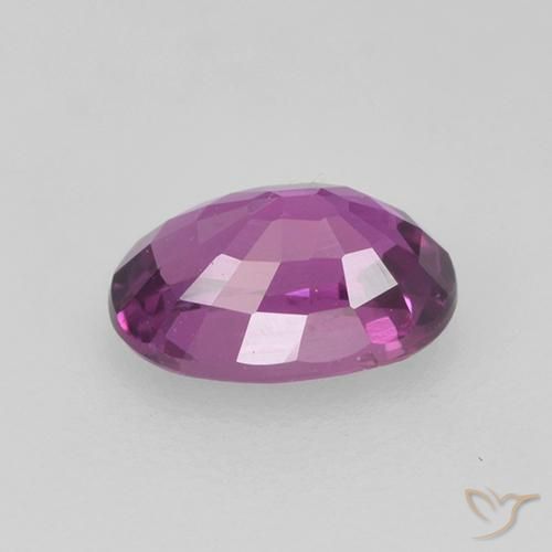 Zafiro Magenta eléctrico natural de 0.73 ct, Ovalada, VS