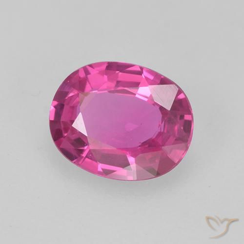 Zafiro Magenta intenso natural de 0.61 ct, Ovalada, VS