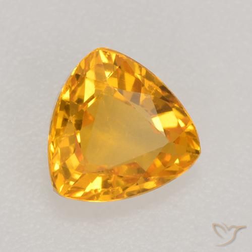 Zafiro Dorado naranja natural de 0.64 ct, Trillón, VVS-VS
