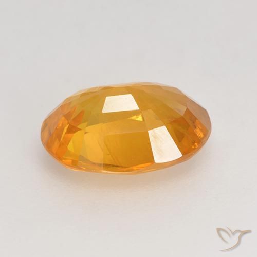 Zafiro Dorado naranja intenso natural de 1.67 ct, Ovalada, VS-SI