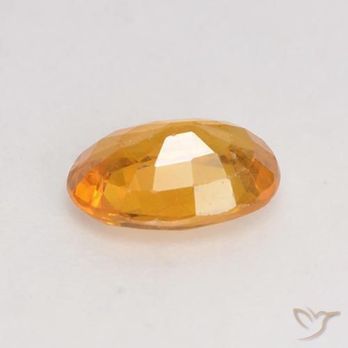 Zafiro Naranja medio natural de 0.88 ct, Ovalada, VS-SI