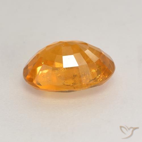 Zafiro Dorado naranja intenso natural de 1.88 ct, Ovalada, VS-SI