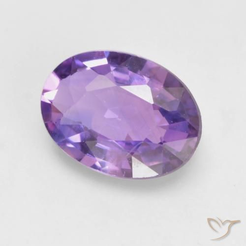 Zafiro Violeta rosado medio natural de 0.58 ct, Ovalada, VVS-VS