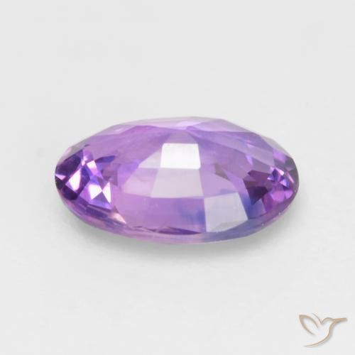 Zafiro Violeta rosado medio natural de 0.58 ct, Ovalada, VVS-VS