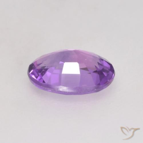 Zafiro Violeta medio natural de 0.56 ct, Ovalada, VS