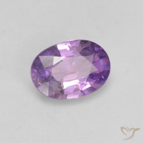 Zafiro Violeta rosado medio natural de 0.54 ct, Ovalada, VS