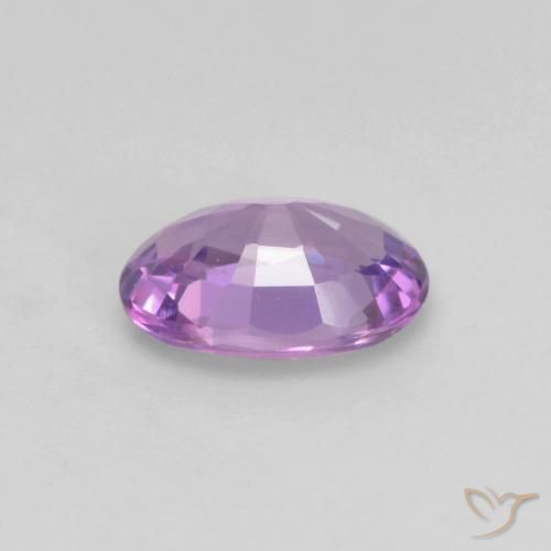 Zafiro Violeta rosado medio natural de 0.54 ct, Ovalada, VS