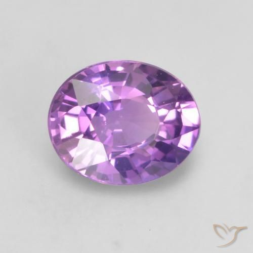 Zafiro Violeta rosado vívido natural de 0.56 ct, Ovalada, VS