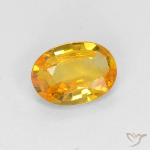 Zafiro Dorado natural de 0.62 ct, Ovalada, VVS-VS