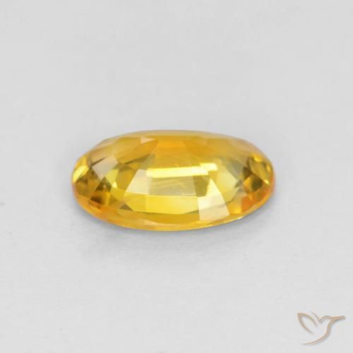 Zafiro Dorado natural de 0.62 ct, Ovalada, VVS-VS
