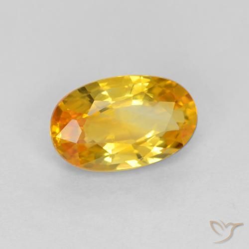 Zafiro Naranja dorado intenso natural de 0.72 ct, Ovalada, VVS-VS