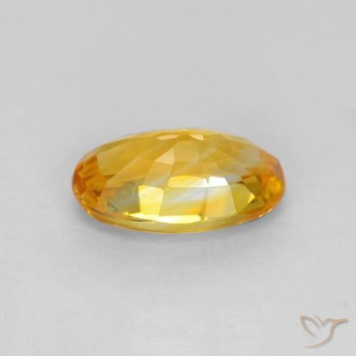 Zafiro Naranja dorado intenso natural de 0.72 ct, Ovalada, VVS-VS