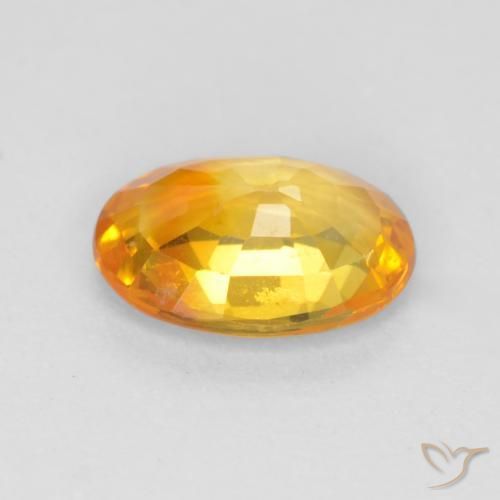 Zafiro Dorado medio natural de 0.70 ct, Ovalada, VS