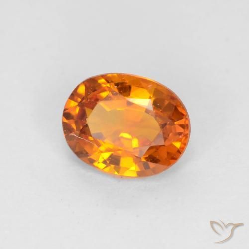 Zafiro Naranja albaricoque natural de 0.57 ct, Ovalada, VS