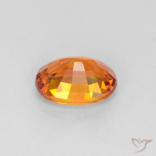 Zafiro Naranja albaricoque natural de 0.57 ct, Ovalada, VS