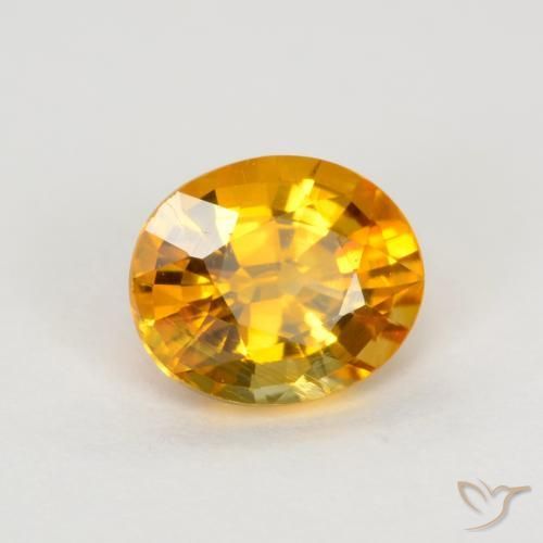 Zafiro Naranja medio natural de 0.74 ct, Ovalada, VS