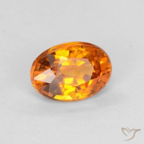 Zafiro Naranja albaricoque natural de 0.59 ct, Ovalada, VS