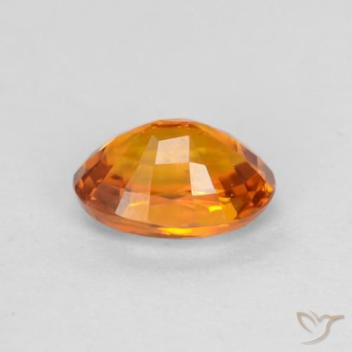Zafiro Naranja albaricoque natural de 0.59 ct, Ovalada, VS