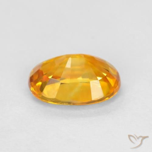 Zafiro Naranja claro natural de 0.78 ct, Ovalada, VS