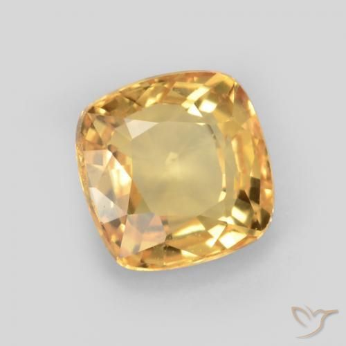 Zafiro Dorado oscuro medio natural de 0.64 ct, Forma Cojín, VS