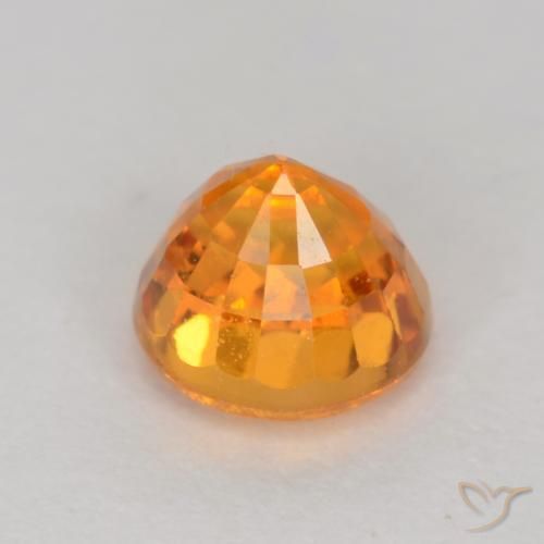 Zafiro Naranja medio natural de 0.67 ct, Corte Redondo, VS