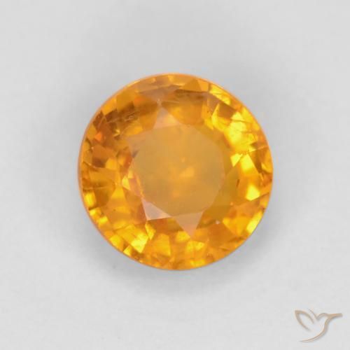 Zafiro Dorado naranja oscuro natural de 0.60 ct, Redondo, VS