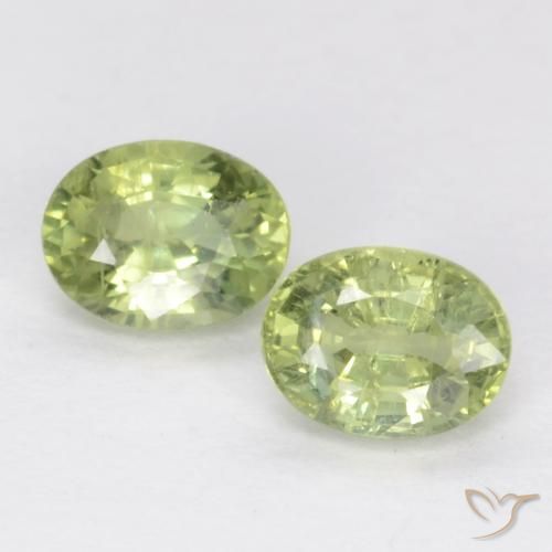 0.56ctw Natural Verde cálido Zafiro, Ovalada, SI
