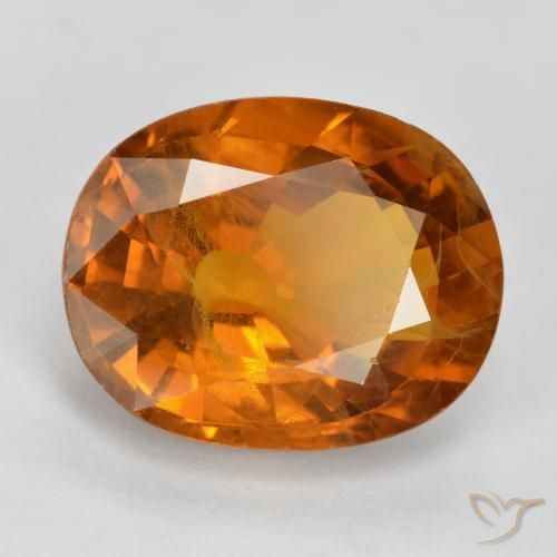 Zafiro Naranja oscuro natural de 5.58 ct, Ovalada, VS-SI